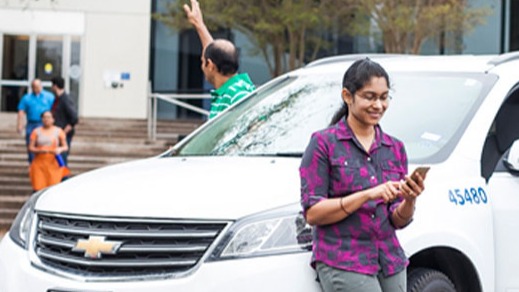Coworkers getting into a Vanpool vehicle
