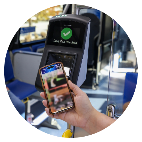 Image of person using Tap to Pay and their Daily fare cap is reached