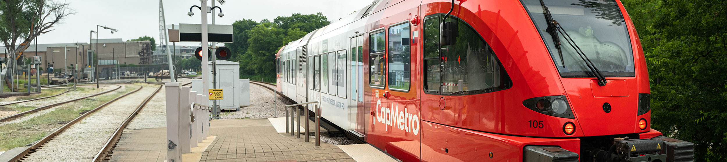 Capmetro Rail station with a red train