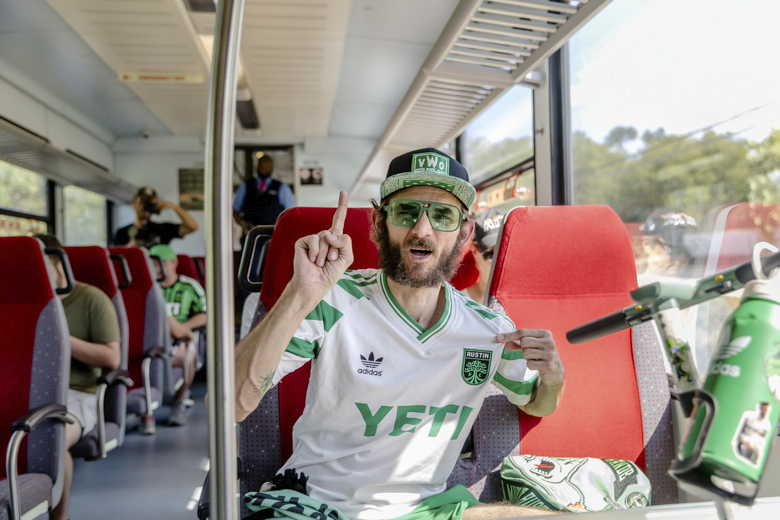 Q2 Fan Riding the Train