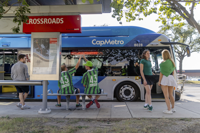 Q@ Fans at the Bus Stop