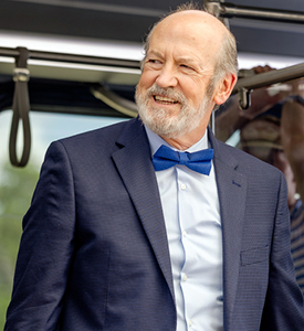 Man is suit on the bus