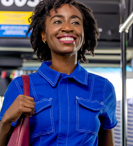Woman smiling on the bus
